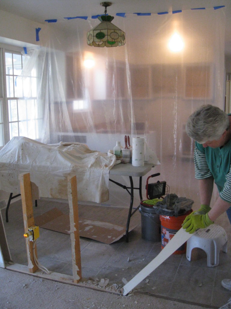 Kitchen Remodel. See how this 1980's kitchen gets some traditional farmhouse kitchen style in this kitchen remodel. See how paint transforms the kitchen cabiets and takes this kitchen from 80's oak to amazing.