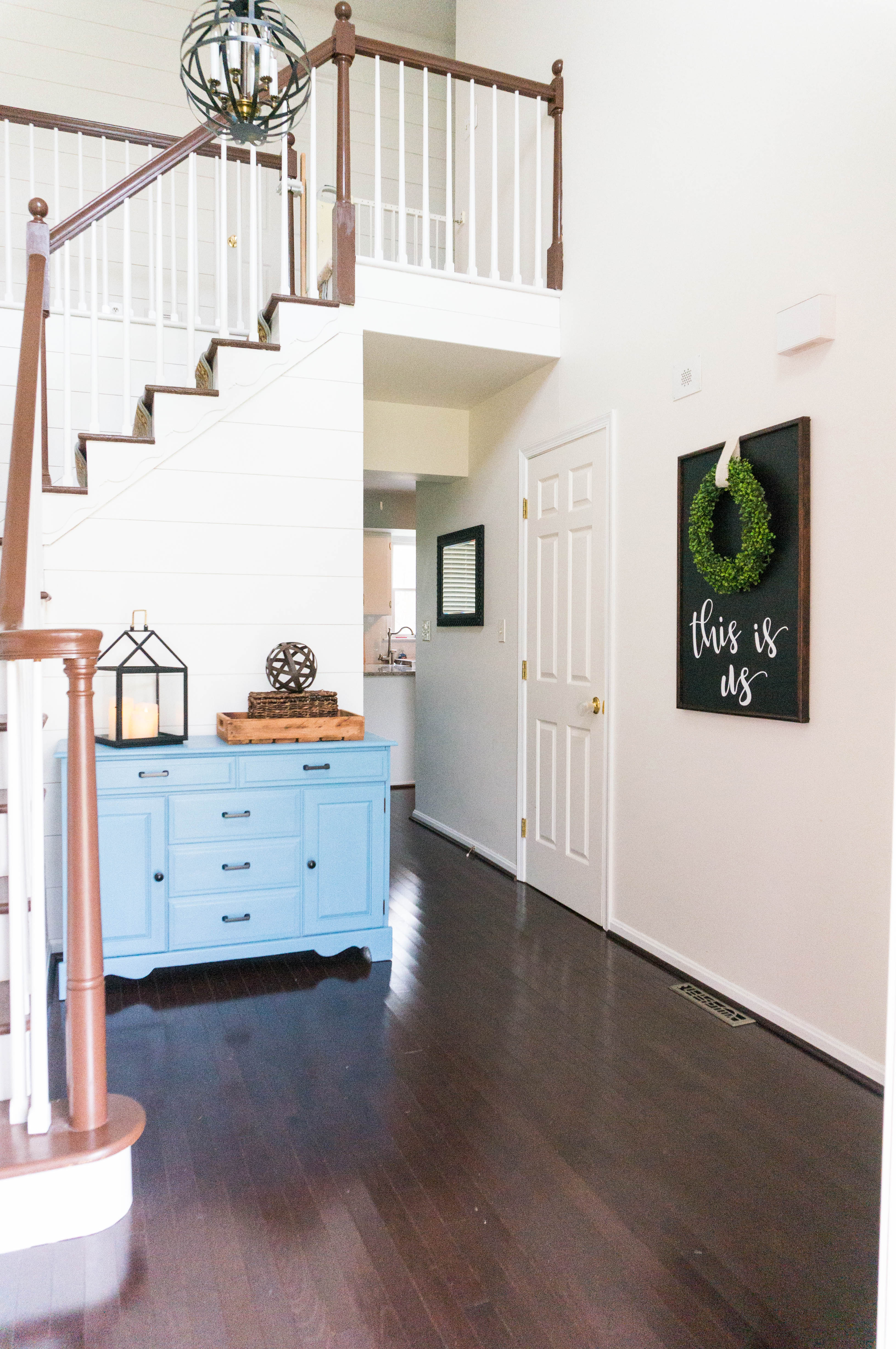 Inexpensive entry remodel reveal. Find out how our farmhouse foyer turned out. Our fixer upper foyer needed a major redo. See how we rennovated our foyer on a budget. #farmhousedecor #farmhouse #fixerupper #foyer #entryway