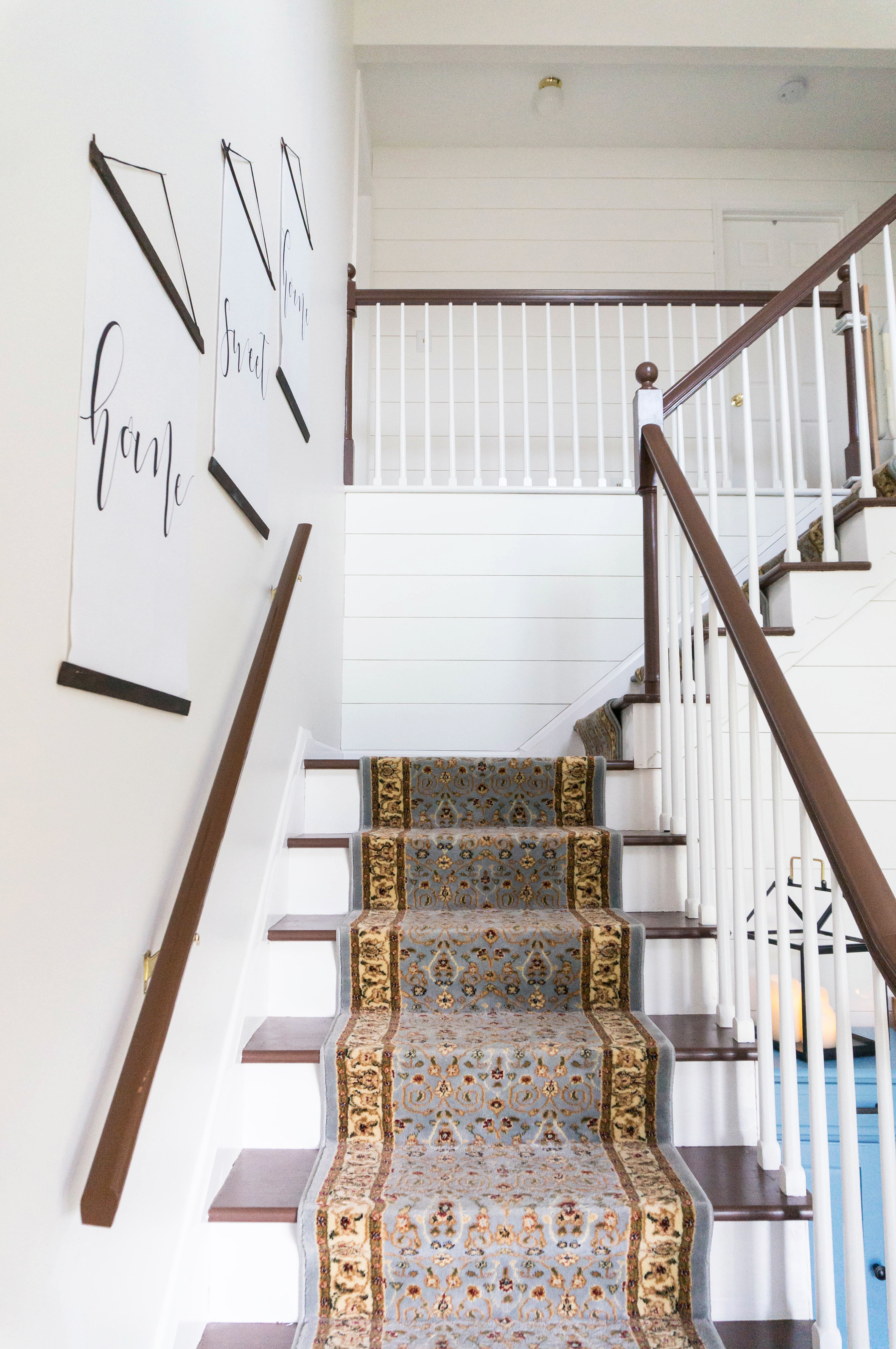 Inexpensive entry remodel reveal. Find out how our farmhouse foyer turned out. Our fixer upper foyer needed a major redo. See how we rennovated our foyer on a budget. #farmhousedecor #farmhouse #fixerupper #foyer #entryway