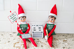 Free Elf on a Shelf Christmas Baking Printable. Free Christmas Cookies printable for The Elf on a Shelf. Print a 3-D oven for your elf, cookie dough, a cookie tray, and free printable Elf-on-a-shelf aprons! #elfonashelf #freeprintables #christmas #freechristmasprintables