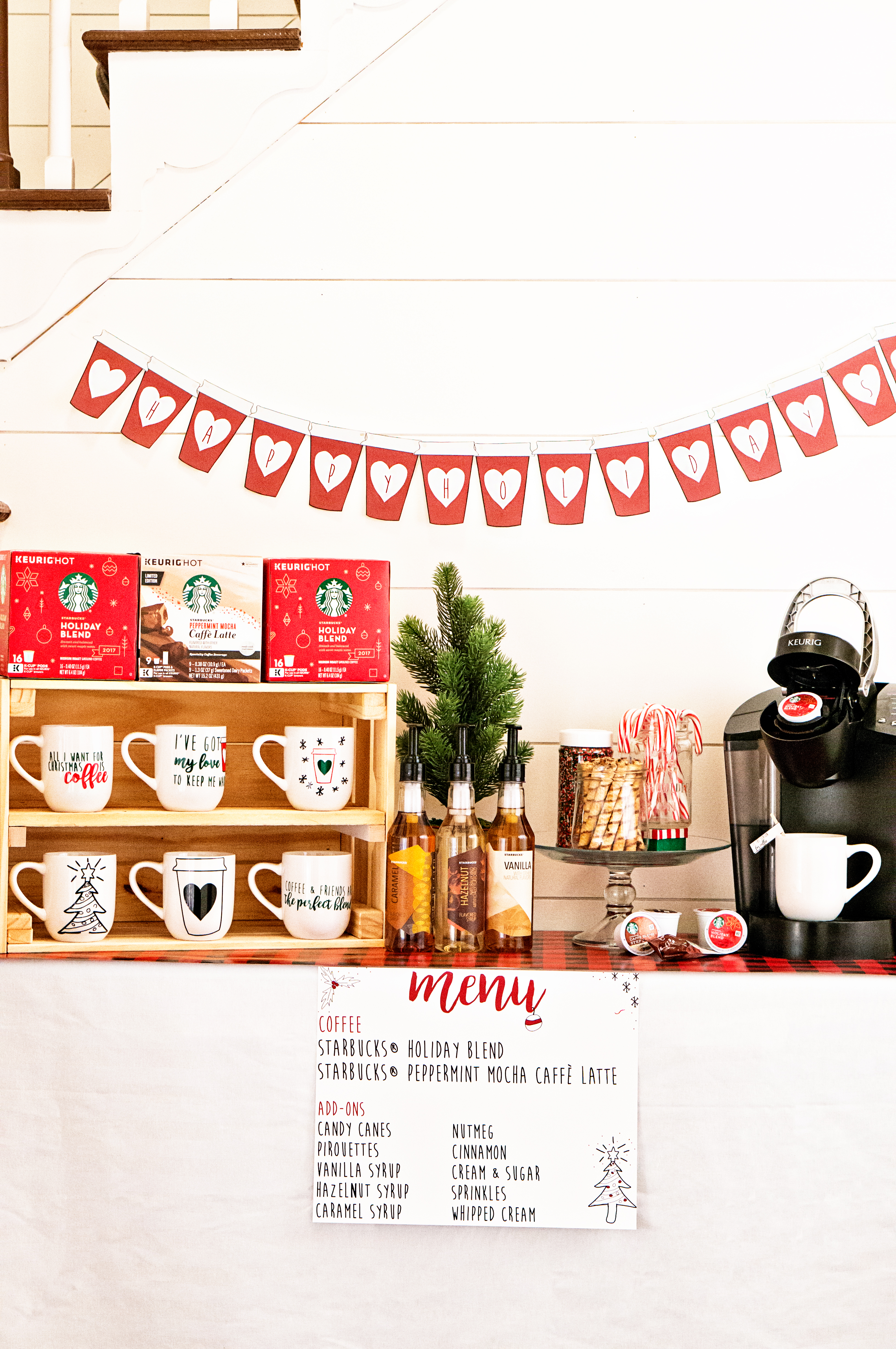 #ad How to Create a Coffee Bar with Starbucks®. Learn some tips and tricks for setting up a holiday coffee bar. Learn how to make a festive party space this Christmas. Free printables included - holiday coffee banner, free coffee gift tag, free Christmas coffee planner stickers, and more. #starbucks #freebies #christmas #coffeebar #SavorHolidayFlavors #plannerstickers