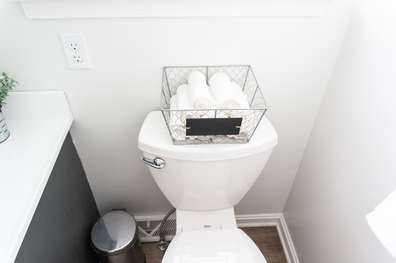 DIY Bathroom Remodel - Check out our DIY bathroom remodel reveal to see how we turned our pink 80's bathroom to a modern farmhouse bathroom for the One Room Challenge. See how we were able to DIY everything ourselves to give our bathroom a completely fresh and clean, farmhouse look. #oneroomchallenge #diy #diyprojects #bathroom #bathroomremodel #farmhousestyle