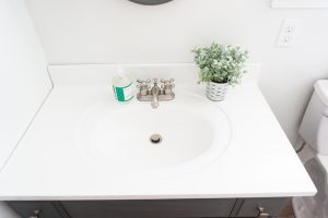 DIY Bathroom Remodel - Check out our DIY bathroom remodel reveal to see how we turned our pink 80's bathroom to a modern farmhouse bathroom for the One Room Challenge. See how we were able to DIY everything ourselves to give our bathroom a completely fresh and clean, farmhouse look. #oneroomchallenge #diy #diyprojects #bathroom #bathroomremodel #farmhousestyle