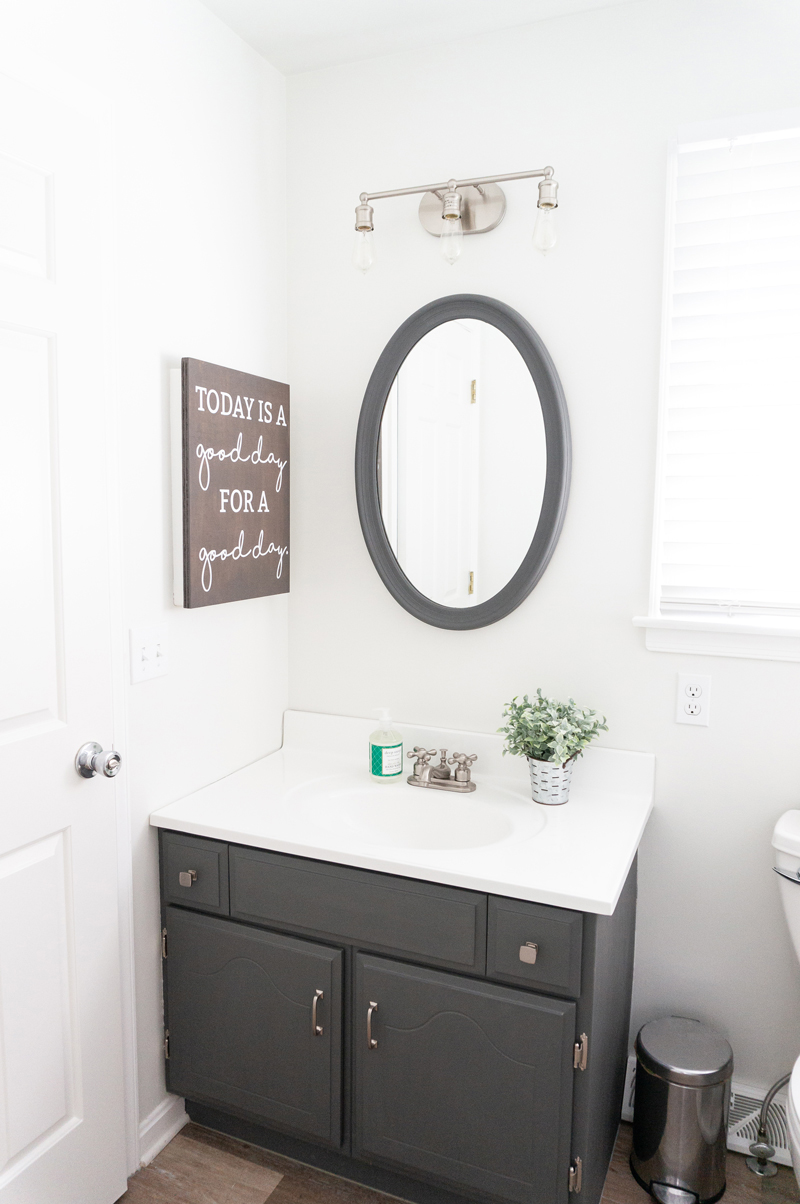 DIY Bathroom Remodel - Check out our DIY bathroom remodel reveal to see how we turned our pink 80's bathroom to a modern farmhouse bathroom for the One Room Challenge. See how we were able to DIY everything ourselves to give our bathroom a completely fresh and clean, farmhouse look. #oneroomchallenge #diy #diyprojects #bathroom #bathroomremodel #farmhousestyle