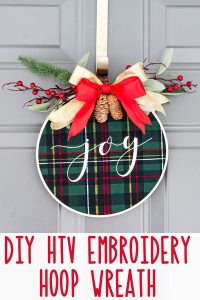 Embroidery hoop Christmas wreath. Create this easy and beautiful Christmas wreath using HTV. It's an easy Silhouette or Cricut Christmas craft. #silhouette #cricut #christmasdecor #christmasdiy