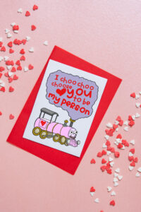 This image shows a card on it that saysI choo choo choose you to be my person and has a picture of a train. It's one of the free printable friendship cards you can get at the end of this blog post.