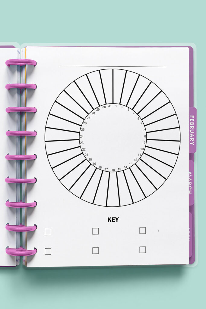 This image shows one of the free circle habit trackers available to download at the end of this post. This particular image shows one of the circular habit trackers that has a key. The files are available with and without a key at the bottom and for 28, 29, 30, and 31 days.