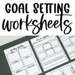 Free yearly goal-setting worksheets displayed on a table, showing multiple printable pages with boxes for long-term goals, action steps, rewards, and reflections.