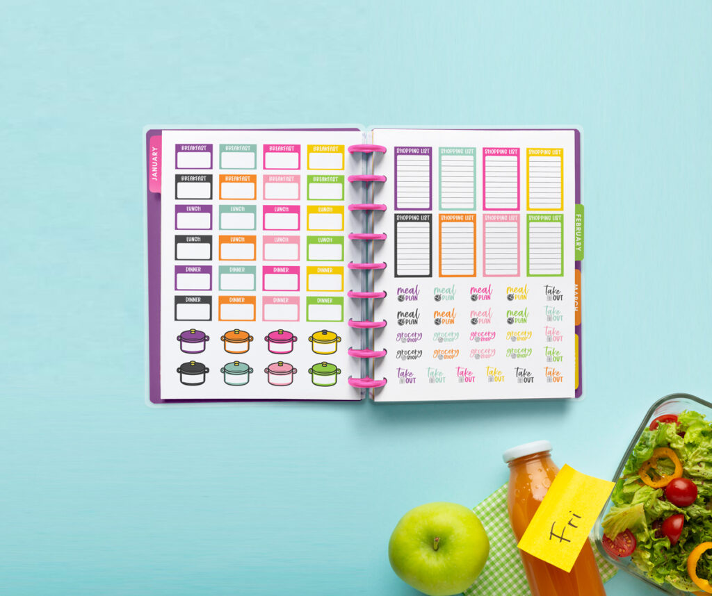 This image shows 2 of the Meal Planning Stickers sheets available to download for free at the end of this blog post. This image represents the printable version of the free meal planning stickers available but digital stickers are available as well.