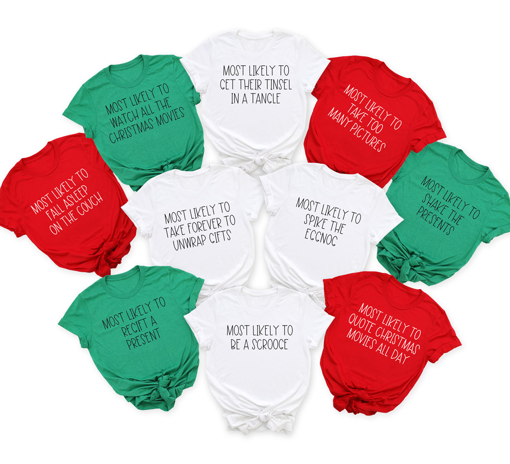 Image of some of the free files available to download in this post. They are on t-shirts in red, green, and white. They are Christmas themed SVGs that say "Most likely to..." and various phrases. 