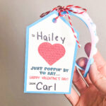 This image shows the Pop-it Valentine Printable available to download at the end of this post. This image is showing one of the two free pop-it valentines you can download - the gift tag version.