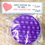 This image shows the Pop-it Valentine Printable available to download at the end of this post. This image is showing one of the two free pop-it valentines you can download - the baggie cover.
