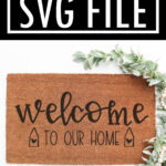 This image shows one of the two versions of the welcome to our home SVG files that are available to download for free at the end of this post. This image shows an example of the free welcome to our home SVG on a doormat.