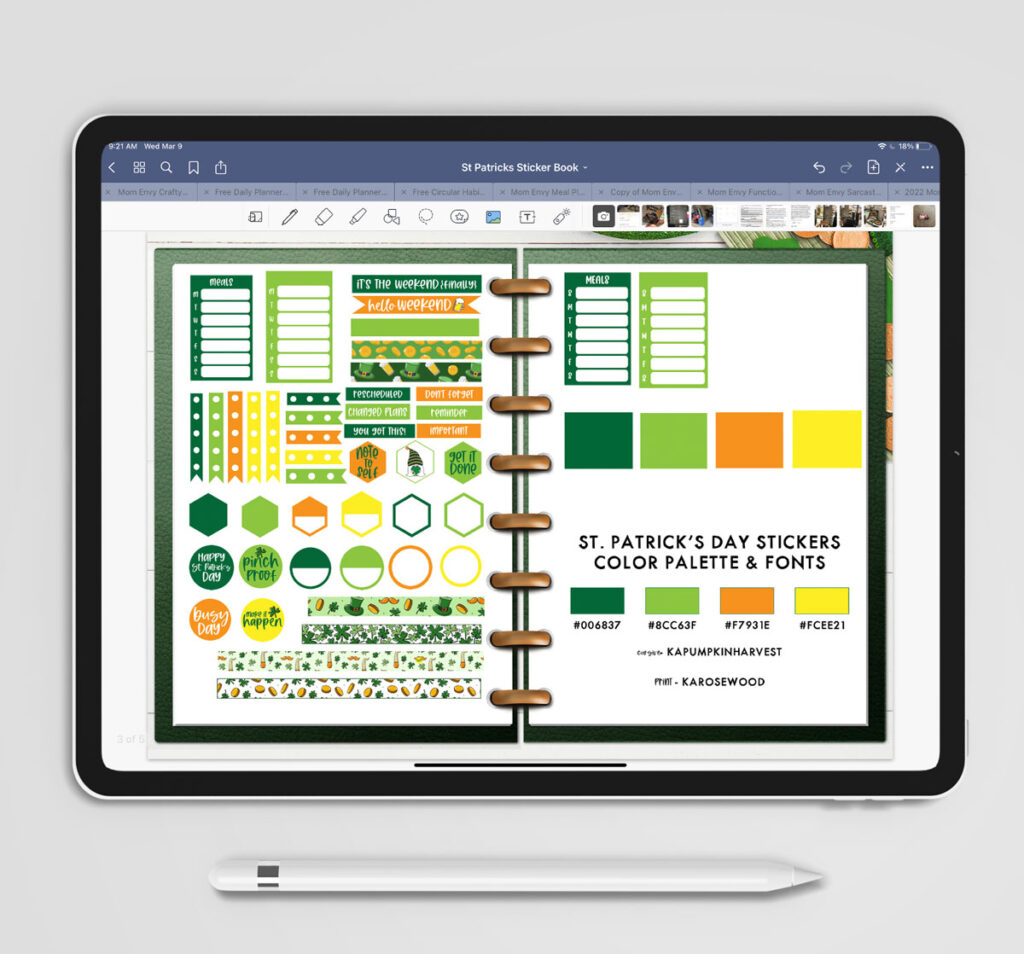 This image shows some of the available free Saint Patrick's Day stickers you can download at the end of this post. It shows an iPad and Apple Pencil. The screen is shows a Goodnotes program with an open green planner with some of the free stickers you can download. The planner is resting on some paper four leaf clovers and gold coins.