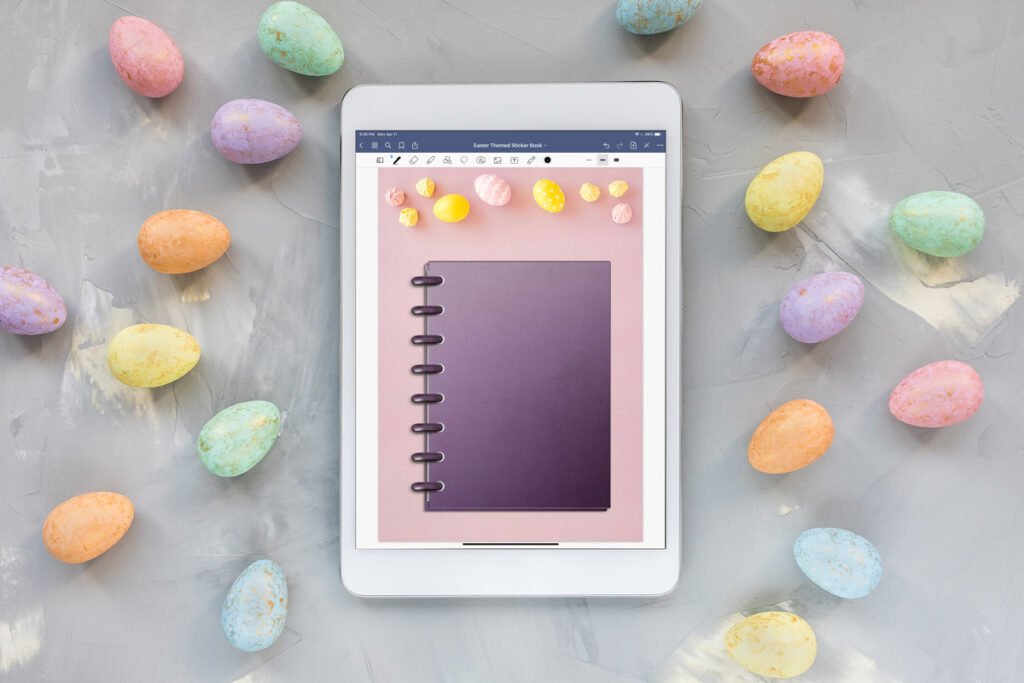 This image shows an example of an iPad with the free Goodnotes file that you can download at the end of this blog post to get the free digital Easter planner stickers. This image shows the Goodnotes file open to the cover of the free digital sticker book.