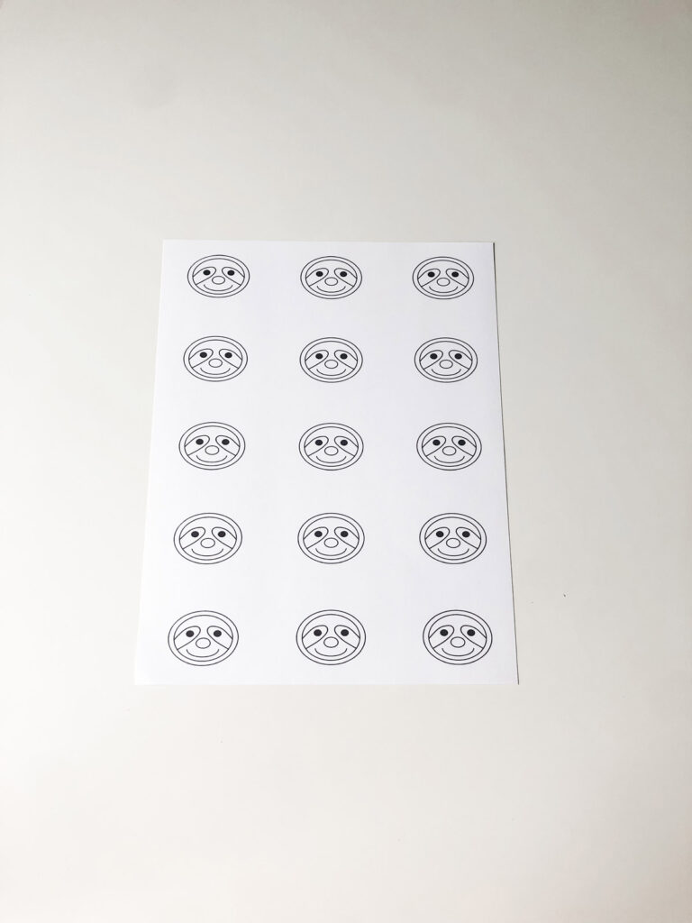 This image shows the free sloth face template you can download at the end of this blog post.