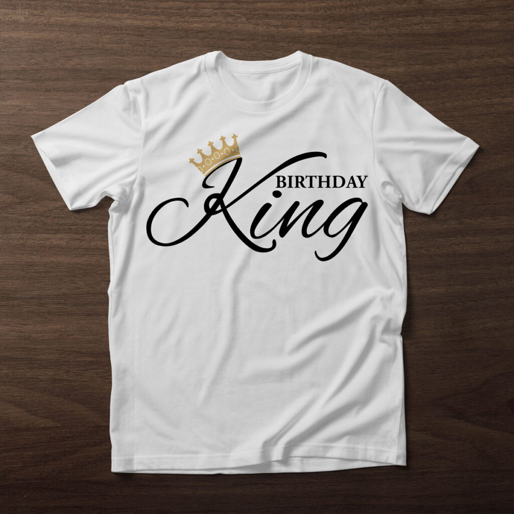 This image shows one of the free birthday SVG files you can get in this blog post. It shows a white t-shirt on a wood background. On the shirt, it has the birthday king SVG.