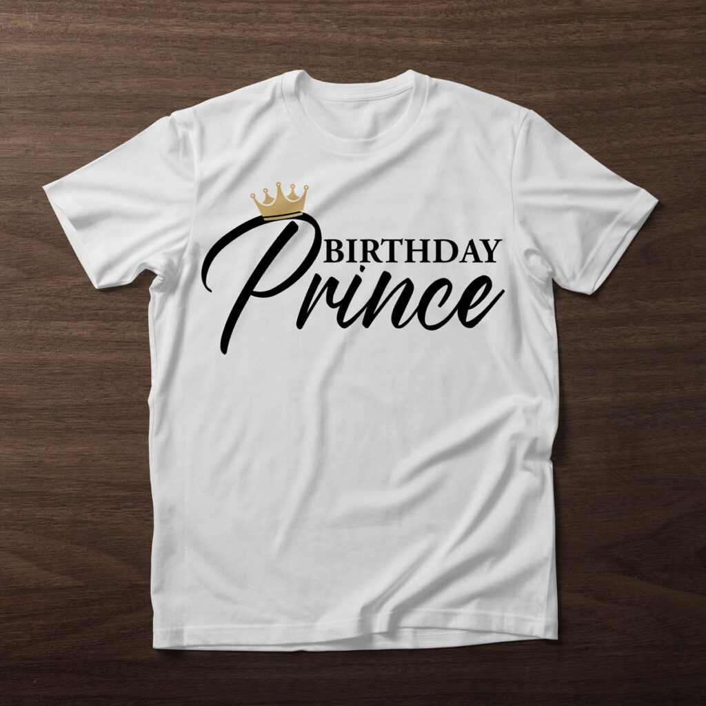 This image shows one of the free birthday SVG files you can get in this blog post. It shows a white t-shirt on a wood background. On the shirt, it has the birthday prince SVG.