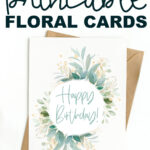 This image shows an example of a flower birthday card you can download for free in this set of 8 free printable birthday cards. The top says 8 free printable floral cards. Below that is an image of the printed card with a circle of green foliage with a gold happy birthday in the middle.