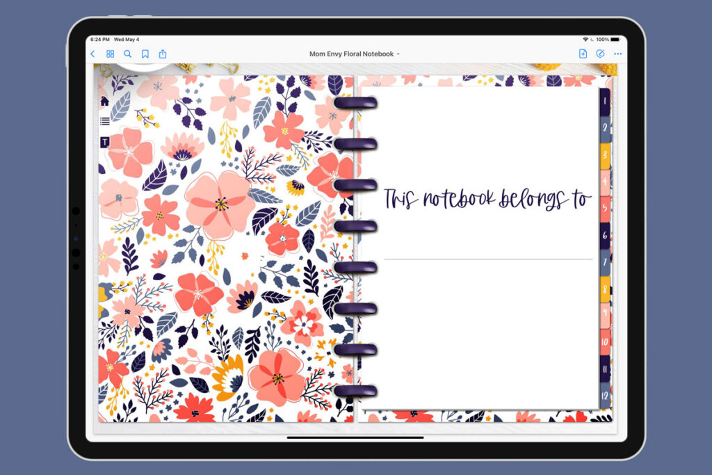 This is an image of an iPad opened up to the second page of the free Digital Notebook you can download for free at the end of this post. The notebook has a floral design and the inner right page says this Notebook Belongs to with a line to fill in a name.