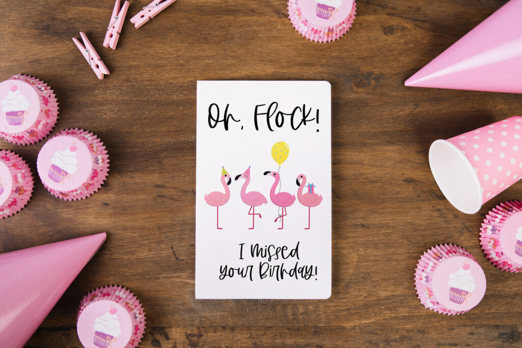 This image is of one of the funny homemade birthday cards you can download for free at the end of this blog post. It says Oh, Flock! I missed your birthday. And it has 4 flamingos wearing hats with balloons.