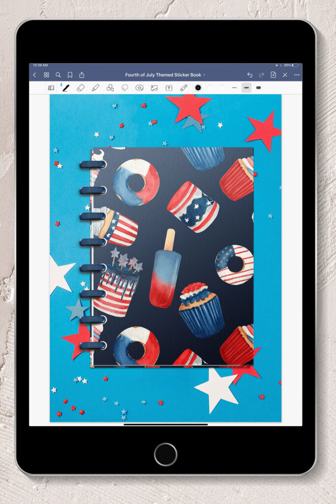 This image shows an iPad opened up to the Goodnotes planner. This is showing the cover of the free Fourth of July Goodnotes sticker book.