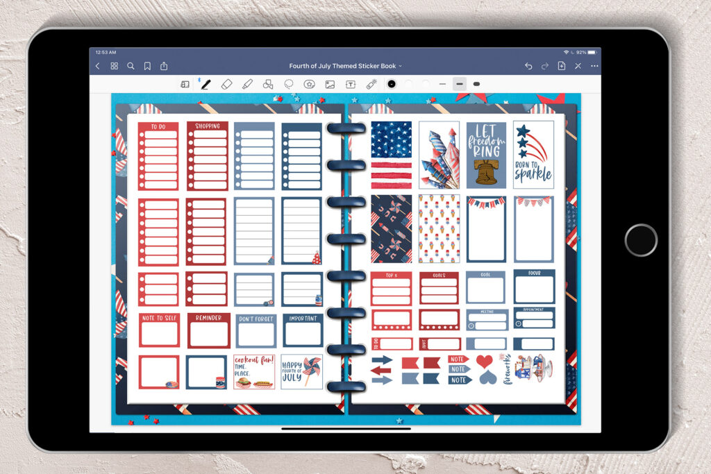 This image shows an iPad opened up to the Goodnotes planner. This is showing the first open spread of the free Fourth of July Goodnotes sticker book.