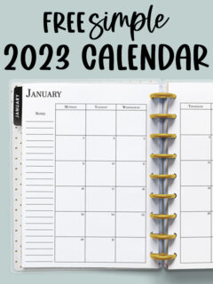 At the top it says free simple 2023 calendar. Below that is an image. This image shows the 2023 calendar printable you can get for free at the end of this blog post. This image shows a simple Classic Happy planner with gold discs opened up to the left side a January 2023 monthly calendar spread.