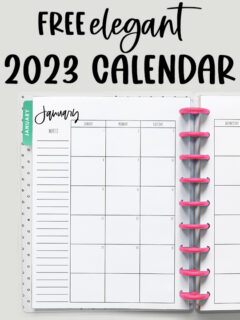 At the top it says free elegant 2023 calendar. Below that is an image. This image shows the free printable 2023 calendar you can get for free at the end of this blog post. This image shows a simple Classic Happy planner with pink discs opened up to the left side a January 2023 monthly calendar spread.