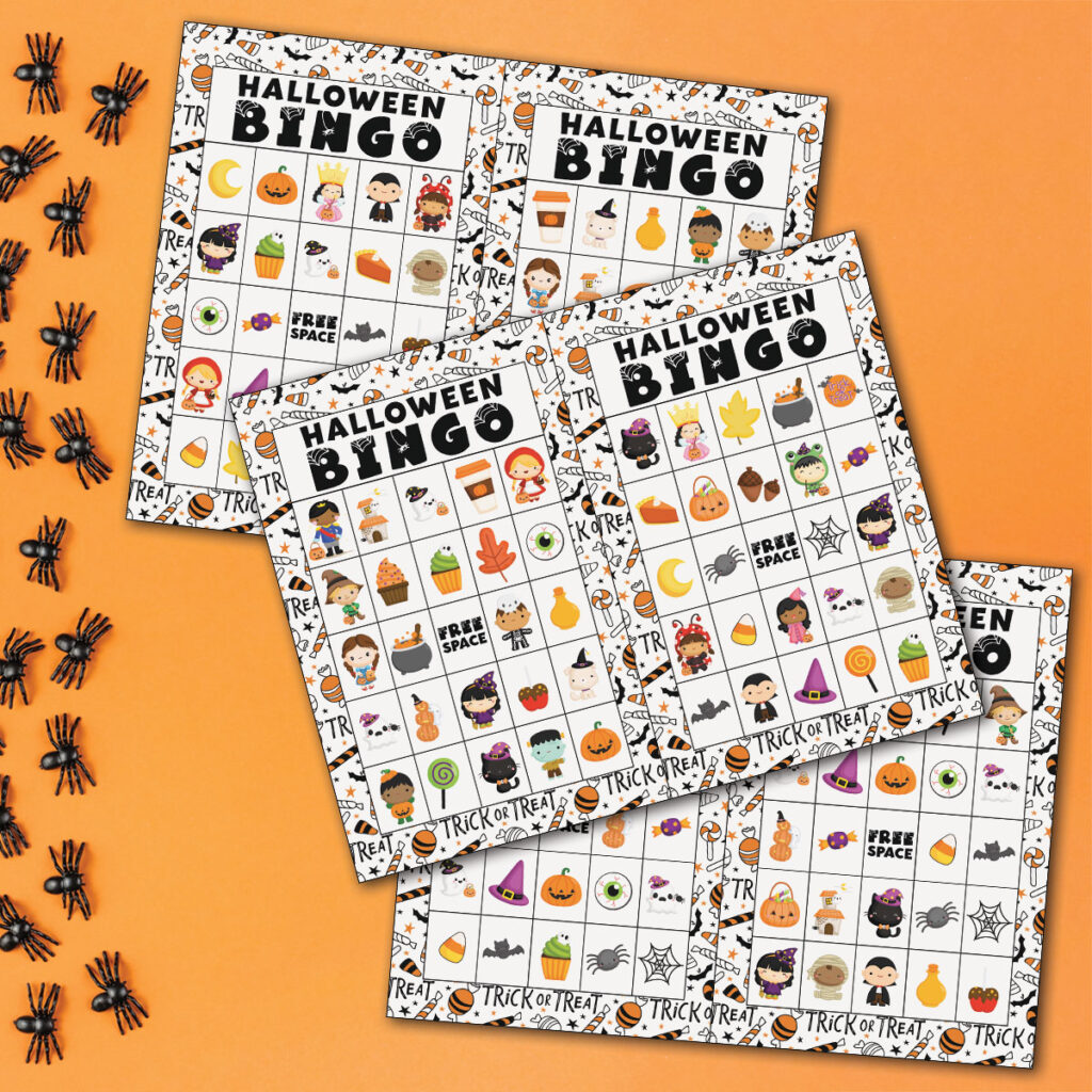 This image shows three of the 40 unique Halloween bingo cards you can get for free at the end of this blog post. The top of the card says Halloween Bingo. Below it are various Halloween images such as pumpkins, Halloween treats, and more. Surrounding the Halloween Bingo printable are some fake plastic spiders.