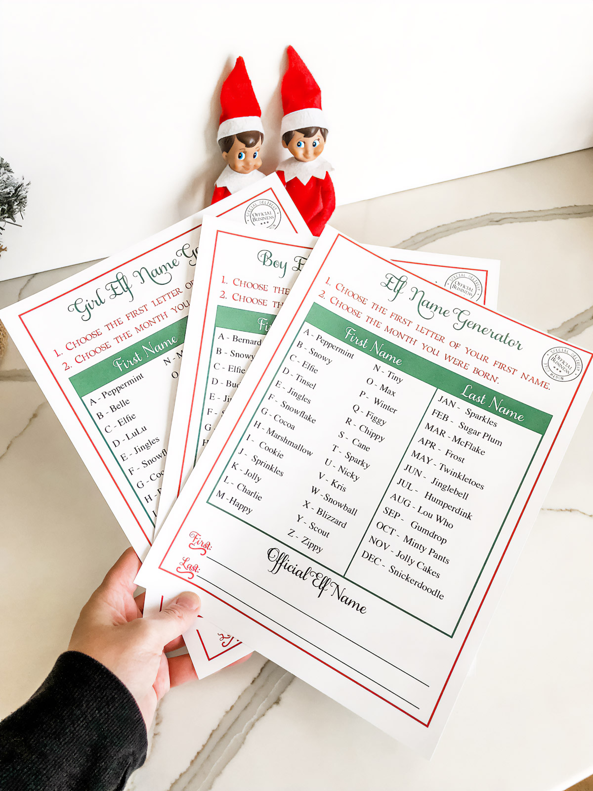 This image shows the three free Christmas elf name generator printables you can get for free at the end of this blog post.