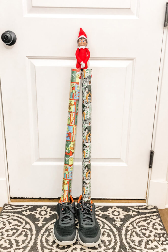 Elf-on-the-Shelf-Ideas-for-Home-Gift-Wrap-Legs-2 - Mom Envy