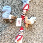 In this image, there are elf on the shelf dolls “sleeping” in socks with 2 stuffed animals also “sleeping” in socks. In the middle is one of the free printable notecards that says slumber party. This is one of the many elf on the shelf ideas for home included in this post. Create a fun elf sleepover with some socks and stuffed friends or dolls. This is just one of 50+ Elf on the Shelf ideas for home. There are tons of easy ideas, funny ideas, last minute ideas, and more. Plus, you’ll get a set of free Elf on the Shelf planning printables. This includes a blank elf on the shelf calendar, list of elf on the shelf ideas, printable elf on the shelf notes, a fillable elf on the shelf note set, and more.