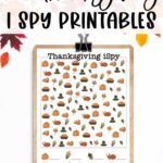At the top, the image says free Thanksgiving I Spy printables. The image has leaves and pumpkins at the top. Below that is a clipboard with the colorful, harder Thanksgiving iSpy worksheet from the Free I Spy Thanksgiving Printables set.