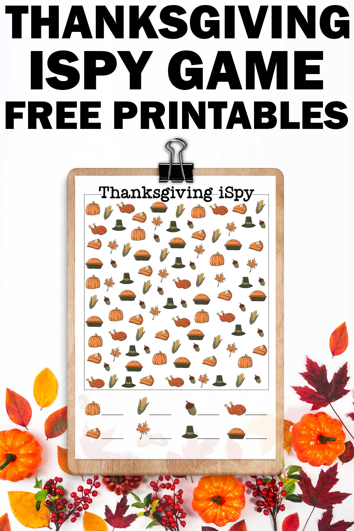 At the top, the image says Thanksgiving I Spy games free printables. The image has leaves and pumpkins at the bottom. Above that is a clipboard with the colorful, harder Thanksgiving iSpy worksheet.