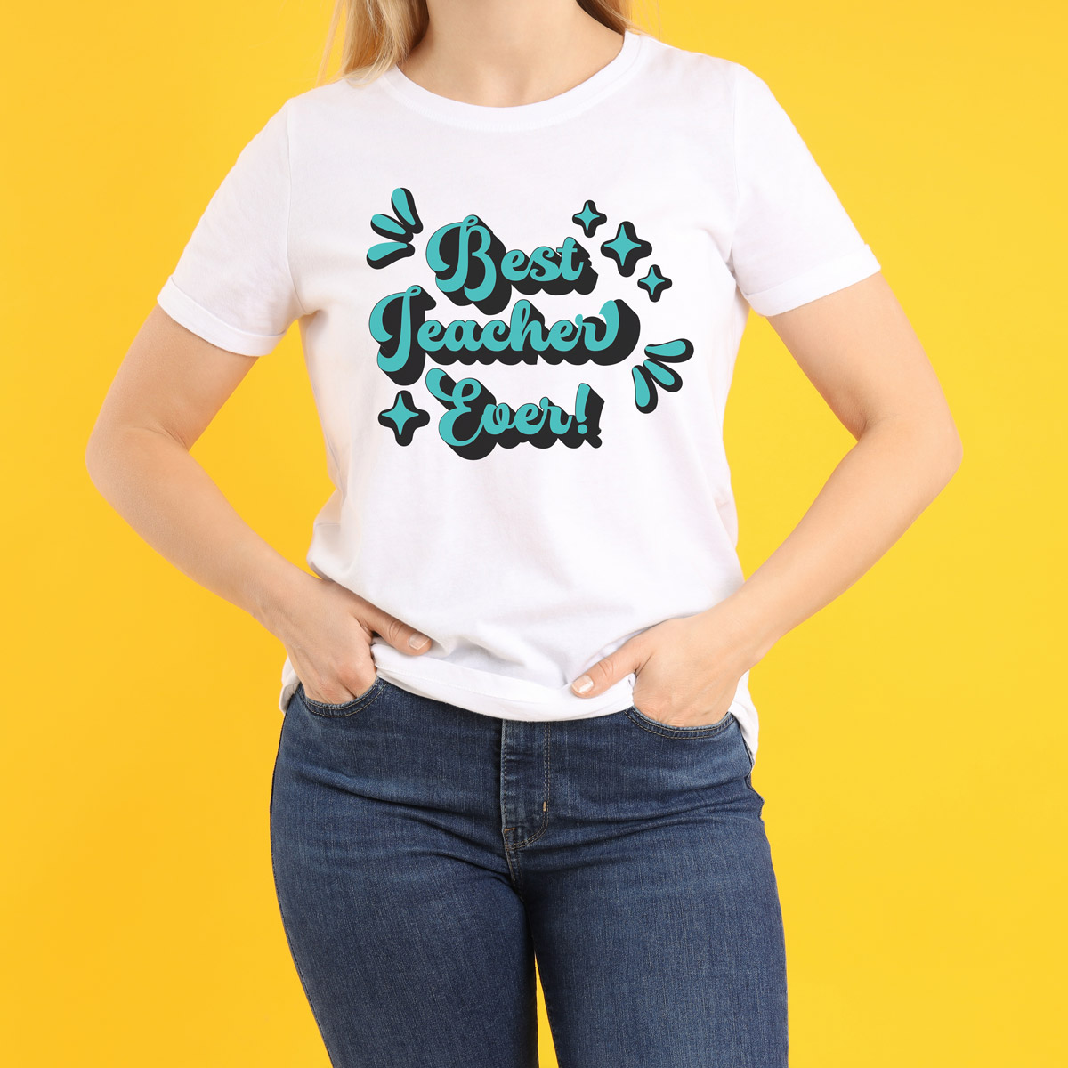 This image shows a woman wearing a shirt that says best teacher ever. It is the best teacher svg free file you can get in this post.