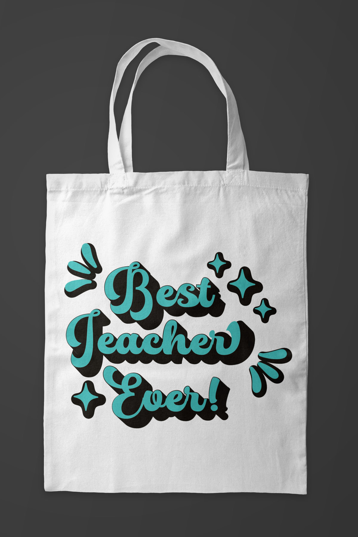 This image shows a tote bag using the best teacher svg free files from this post. It says best teacher ever.