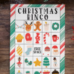 This image shows an example of one of the Christmas bingo printable game boards you can get for free at the end of this blog post.