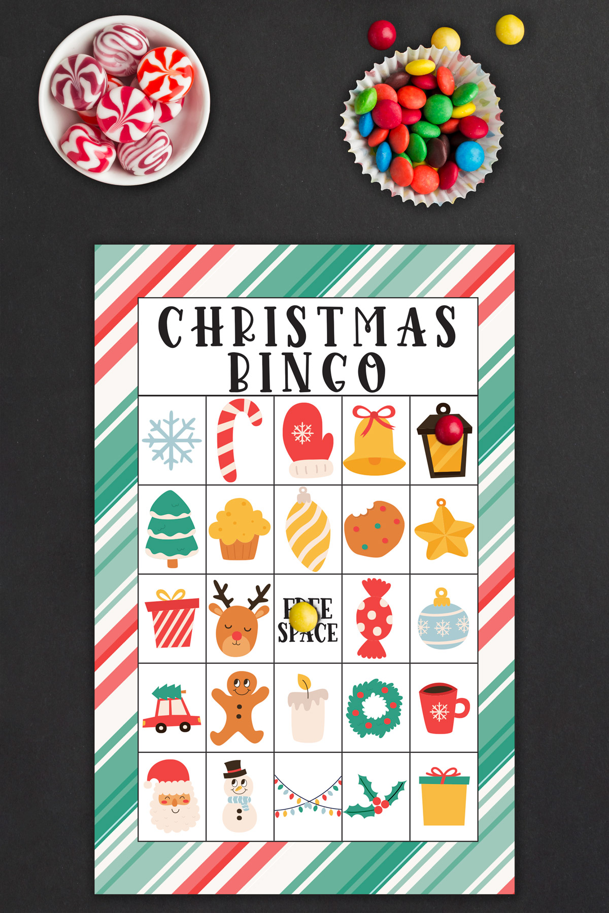 This image shows an example of one of the Christmas bingo printable game boards you can get for free at the end of this blog post.