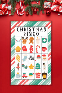 This image shows an example of one of the Christmas bingo printable game boards you can get for free at the end of this blog post.