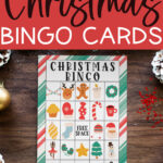 At the top it says Free Christmas Bingo Cards. At the bottom is says 40 unique cards. This image in the middle shows an example of one of the Christmas bingo printable game boards you can get for free at the end of this blog post.