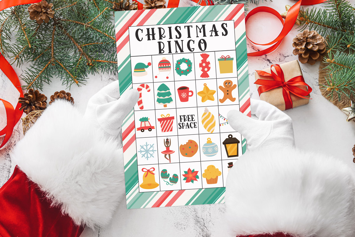 This image shows an example of one of the Christmas bingo printable game boards you can get for free at the end of this blog post.