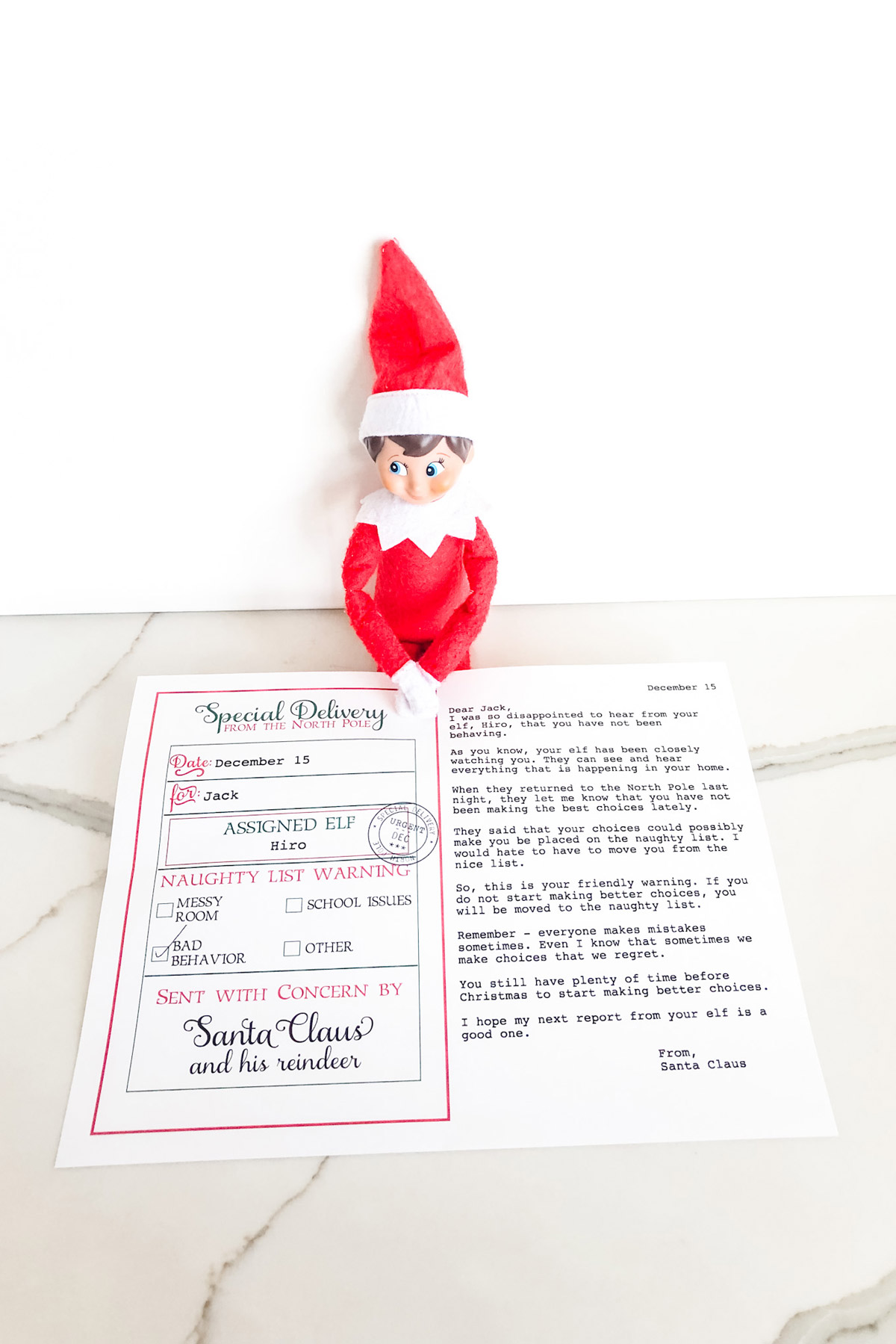 This image is showing an example of the elf warning letter free printable you can get at the end of this blog post.