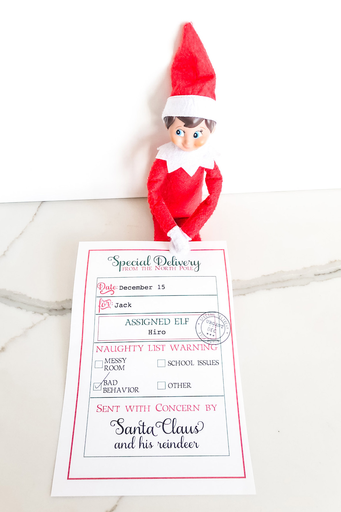 This image is showing an example of the elf warning letter free printable you can get at the end of this blog post.