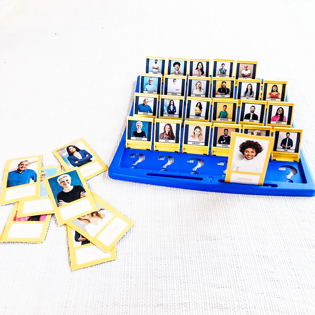 This image is showing an example of a Guess Who game board with a personalized Guess Who Board Game template included.