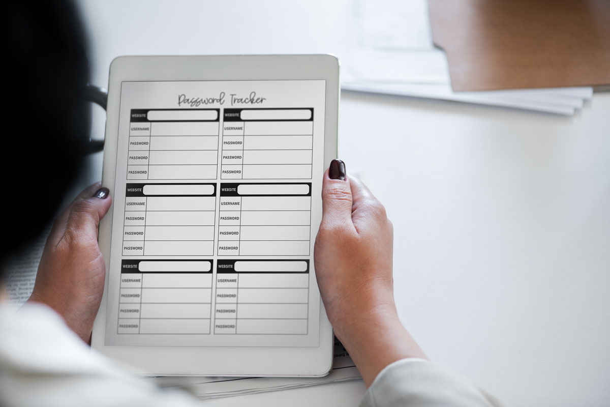 This image shows one of the password tracker printable pages you can get for free at the end of this blog post. In this image it shows the digital planning file version being used on a tablet.