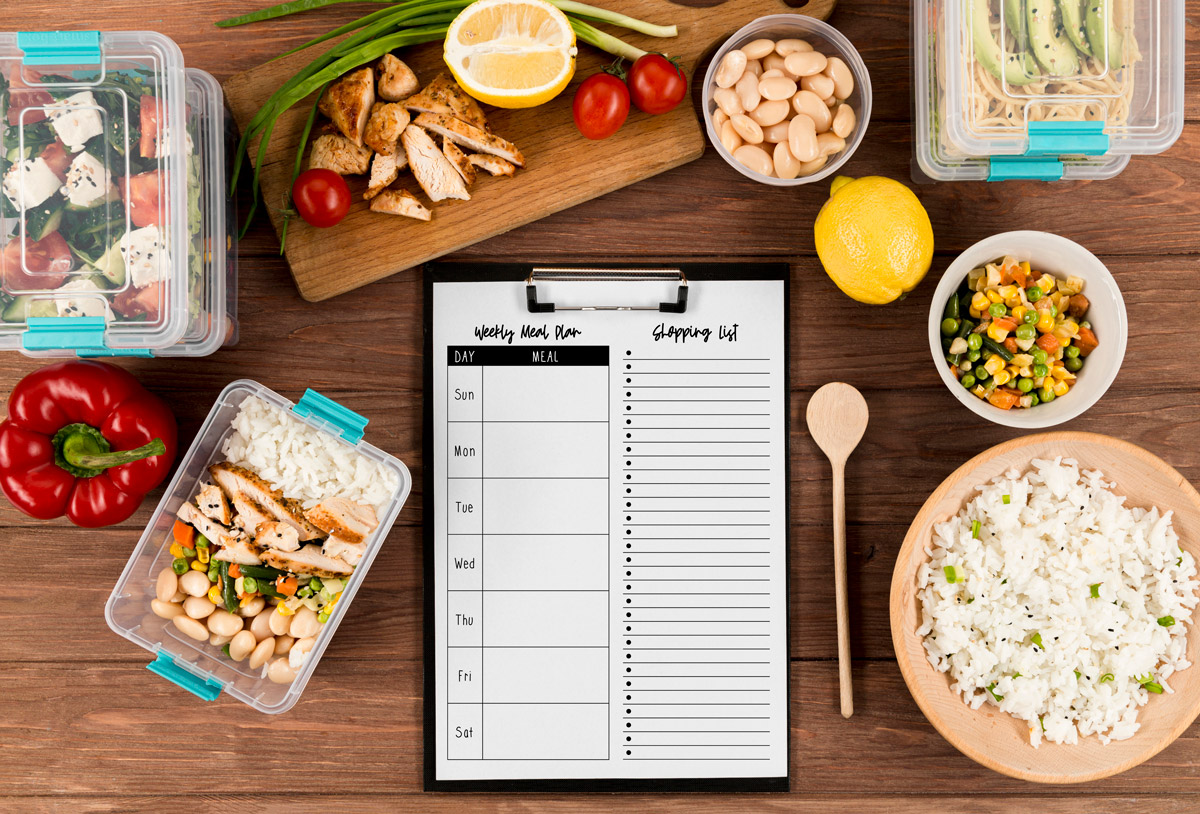 This image shows the printable weekly meal planner with grocery list you can get for free at the end of this blog post. It is the portrait version.