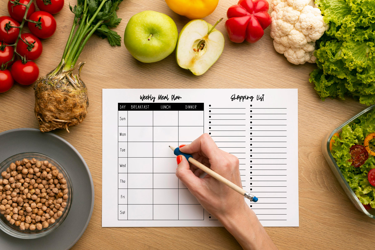 This image shows the printable weekly meal planner with grocery list you can get for free at the end of this blog post. It is the landscape version.