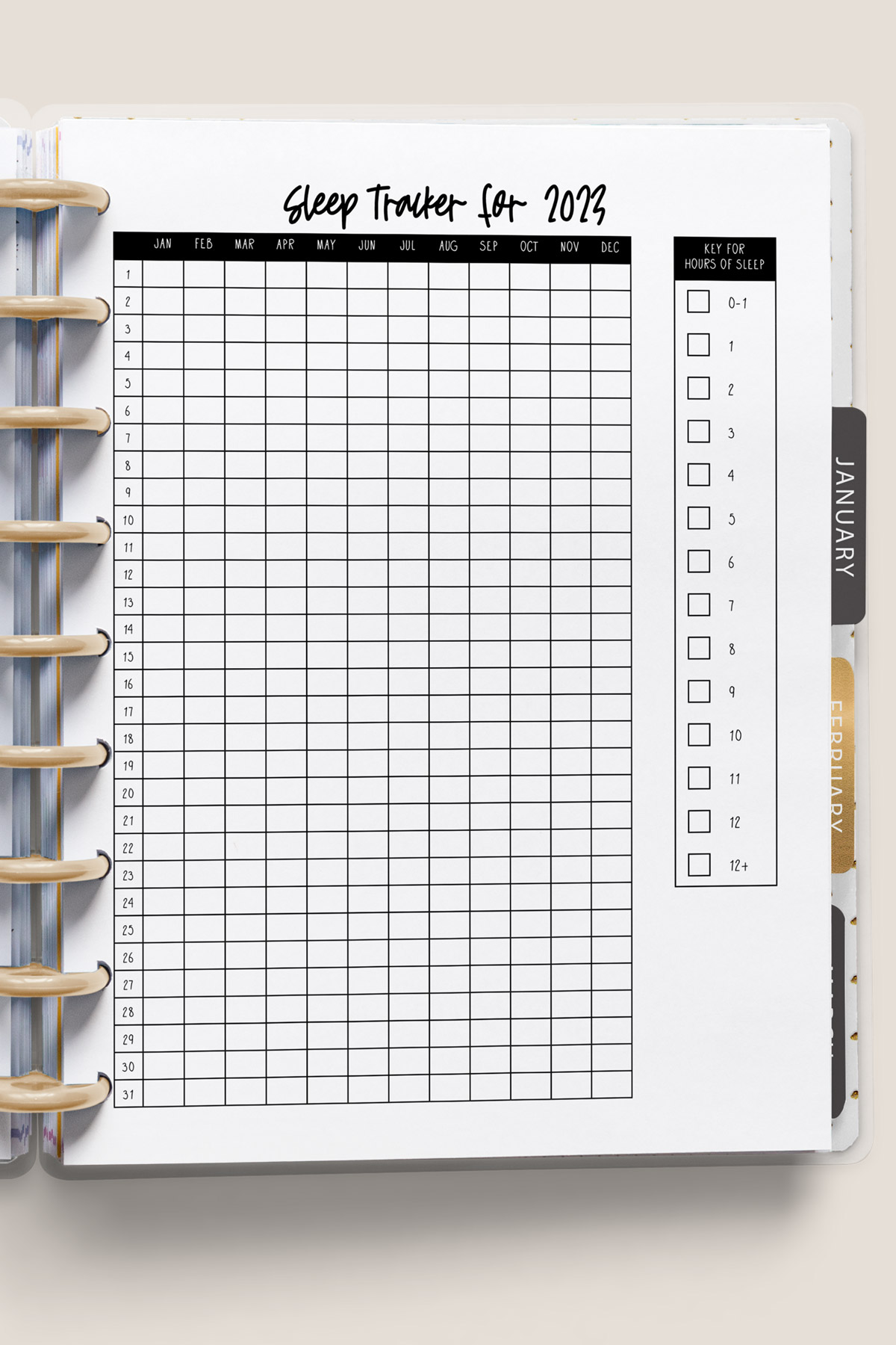 This image shows the sleep tracker printable you can get for free at the end of this blog post. This is showing the yearly version of the sleep log.