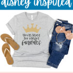This image says free svg file Disney inspired at the top. Below that is a shirt that says you're never too old for fairytales. At the bottom it says Silhouette & PNG Files included, too!